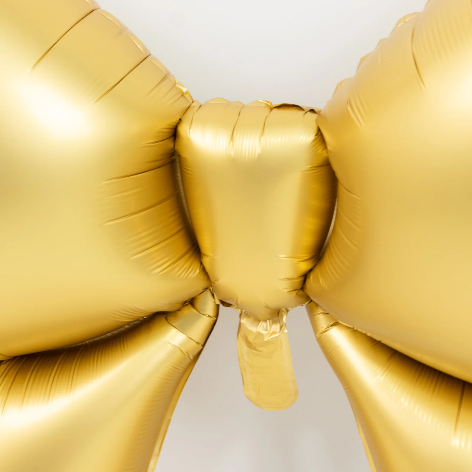 10 Pack Giant Decorative Foil Bow Balloons – Matte Gold Party Balloons for Backdrop, Photo Booth & Event Styling, 29″ x 27″ Inflated - Image 8