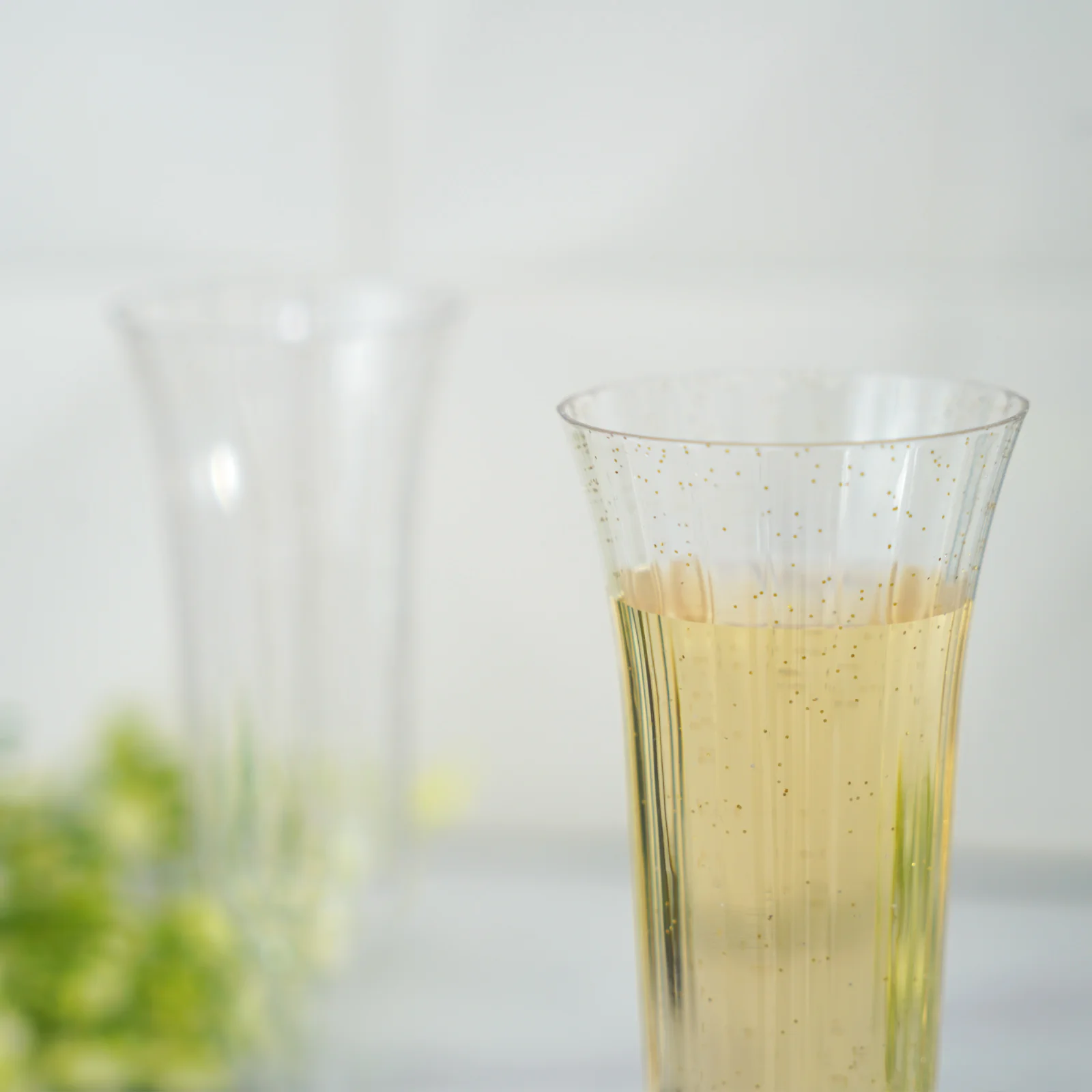 24-Pack Plastic Champagne Flutes Clear Gold Glitter Flared Design - Lightweight Disposable Toasting Glasses 6oz - Image 2